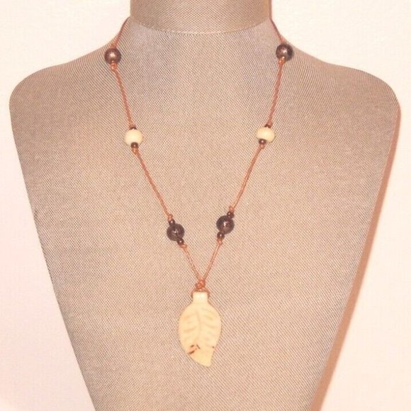 Chico's Jewelry - Chico's Necklace Carved Stone Leaf Pendant Beaded Tan Cord Unique